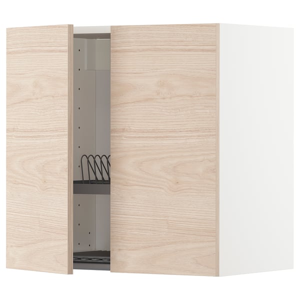 A light wooden kitchen cabinet with a door open, revealing adjustable shelves and a wire dish drainer inside.