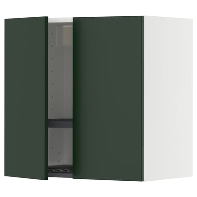 Modern green kitchen cabinet with adjustable shelves, open door.