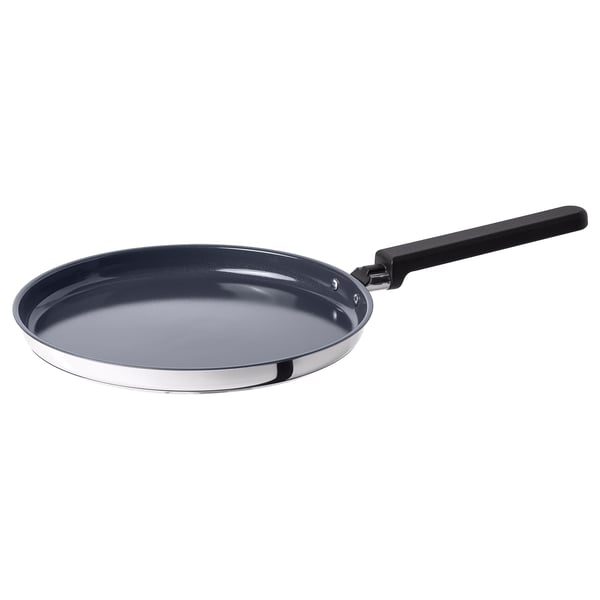 Midagsmat blue non-stick pancake pan with black handle, stainless steel base, sloped sides for easy flipping.