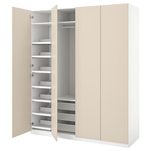 Open beige IKEA PAX wardrobe showing shelves and drawers.