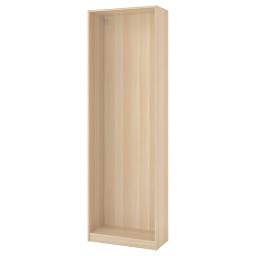 A light wood-colored PAX wardrobe frame, made of particleboard and paper foil, rectangular in shape, standing upright.