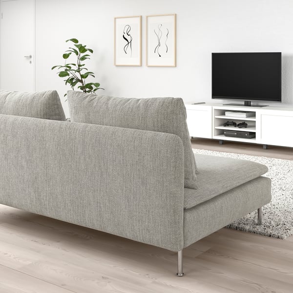 Modern minimalist living room with a grey SÖDERHAMN sofa, tv, and plant.