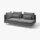 Modern grey sectional sofa, deep seats, loose cushions, sleek metal legs.