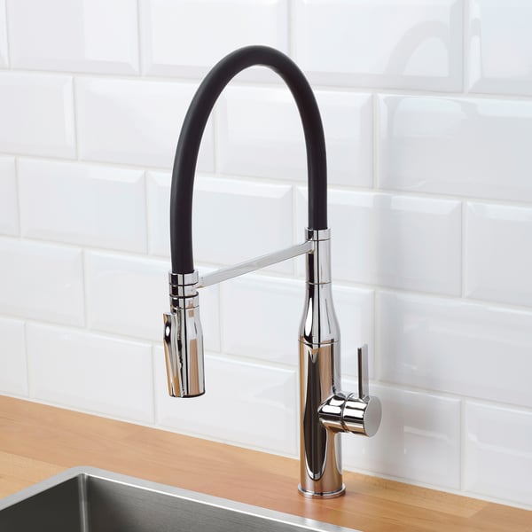 Modern kitchen tap with sleek black handle and chrome finish. A detachable handspray for easy cleaning.