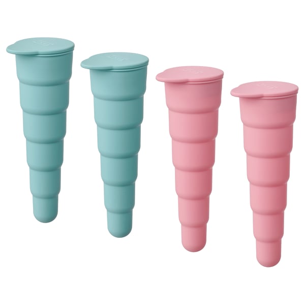 Four colourful silicone ice moulds in green and pink, shaped like ice cream cones, arranged in a row.