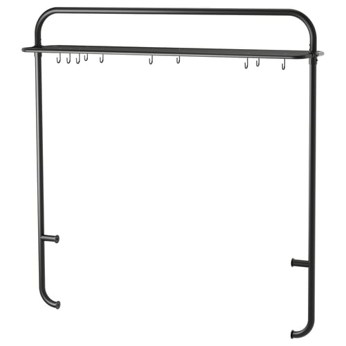 Black metal kitchen rack with hooks and shelf, minimalist design.