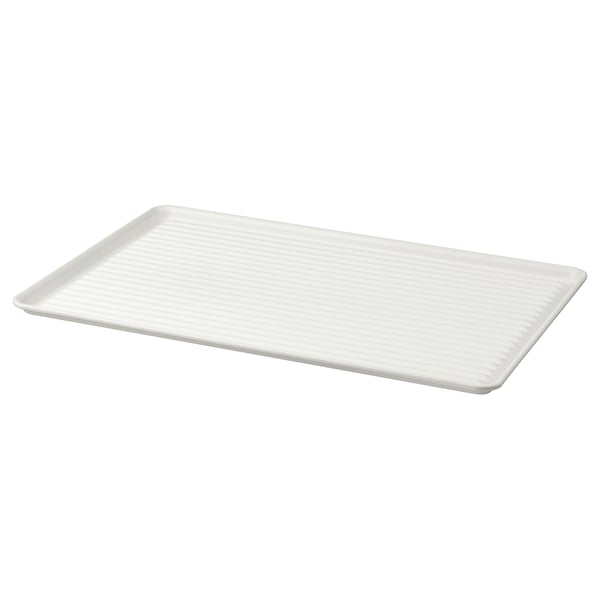 White VÄLVÅRDAD flat dish drainer, rectangular, made of galvanised steel with powder coating, high edges for containing water.