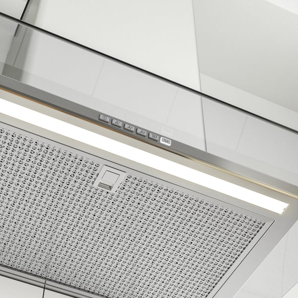 Modern köksfläkt i rostfritt stål med härdad glaskant, elegant design, led-ljus, kontrollpanel på framsidan.