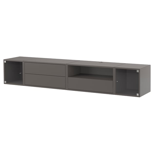 Modern grå vägghängd hylla, minimalistisk design, olika förvaringsmöjligheter.