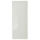 En IKEA HÖGBO vit glasdörr med minimalistisk design och en elegant aluminiumram.