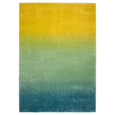 HOTELLRUM matta: gradient blå-grön-gul, mjuk lugg, rektangulär, varsity färger.