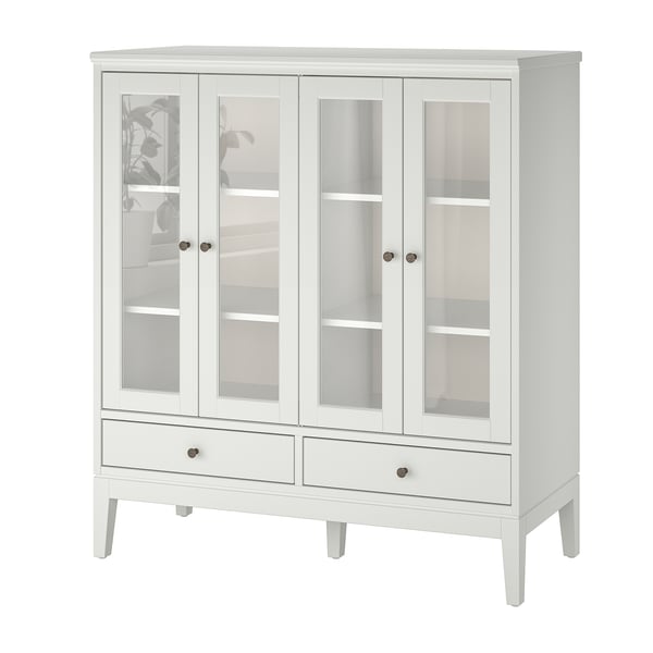 Vitt IDANÄS skåp med glasdörrar och lådor, elegant design.