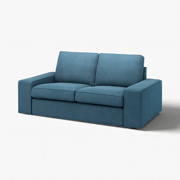 Blå KIVIK-soffa, modern minimalistisk design, mjukt tyg, fyrkantiga dynor, mysigt och inbjudande.