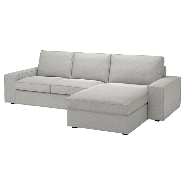 KIVIK sektionssoffa, ljusgrå, låga armstöd, djupa kuddar, avtagbar klädsel. Perfekt för avkoppling, minimalistisk inredning.