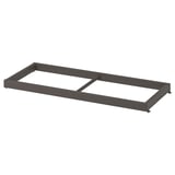 En grå KOMPLEMENT klädstång, rektangulär till formen, designad för att passa in i garderober, med en robust metallram.