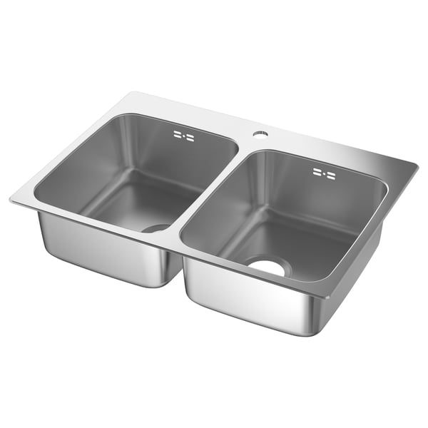 En diskbänk i rostfritt stål LÅNGUDDEN med dubbla handfat. Den eleganta, rektangulära designen har två djupa fack för effektiv tvätt och rengöring.