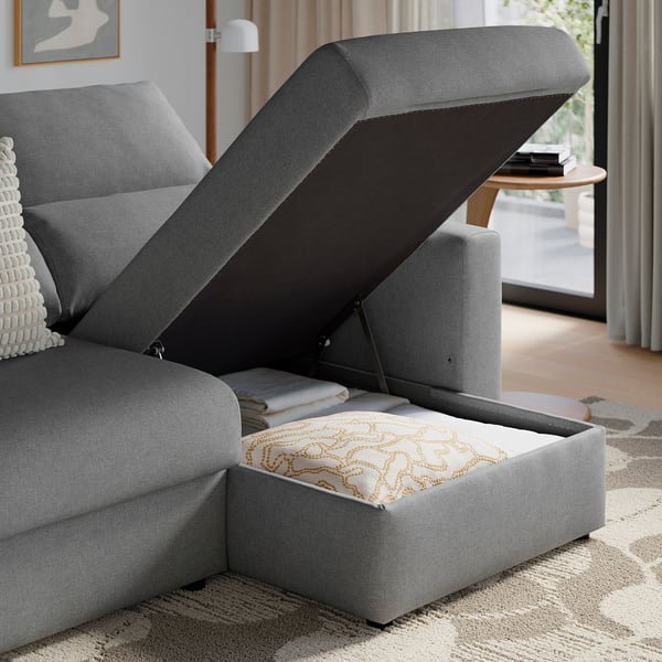 Sofa med utfällbar schäslong och förvaringsfotpall.