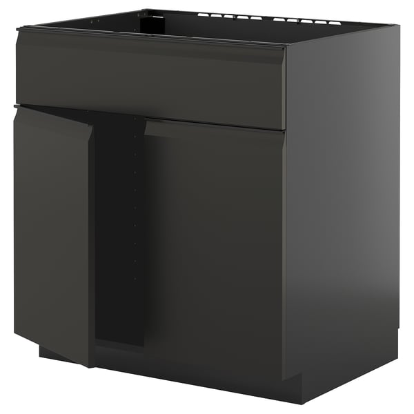Modernt svart köksskåp, fyrkantigt, med rena linjer och elegant design.