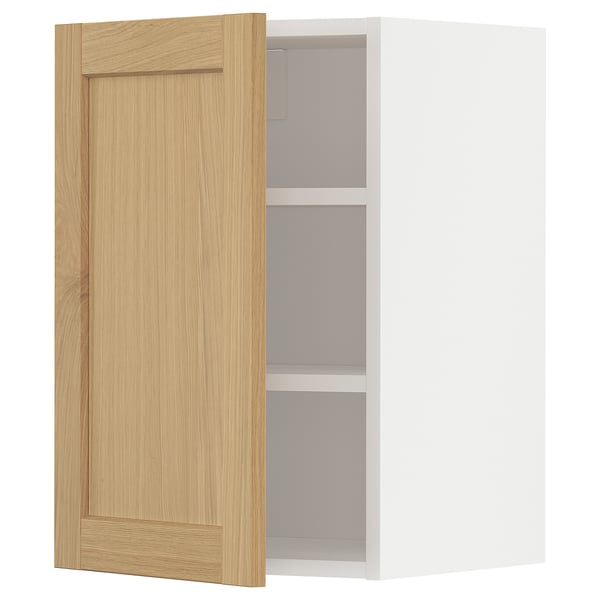 METOD köksskåp: lucka i ljust trä, vit inredning, minimalistisk design.