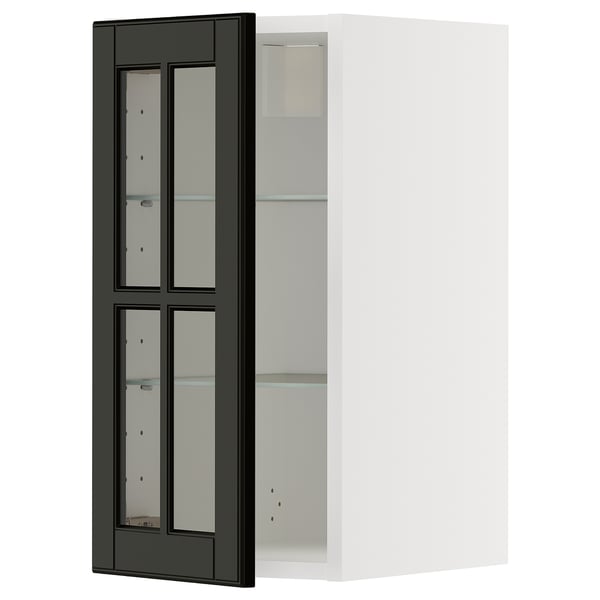 Ett svart skåp med glasdörrar från kökssystemet METOD. Den har en elegant, modern design med fasade kanter och en robust ram.