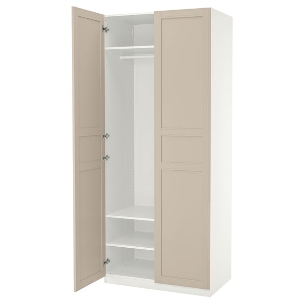 PAX garderob, benvit, rektangulär, med beige dörrar, justerbara hyllor, mjukstängande gångjärn.
