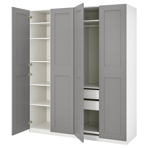 En grå ikea PAX-garderob med öppna dörrar som avslöjar hyllor och lådor inuti.