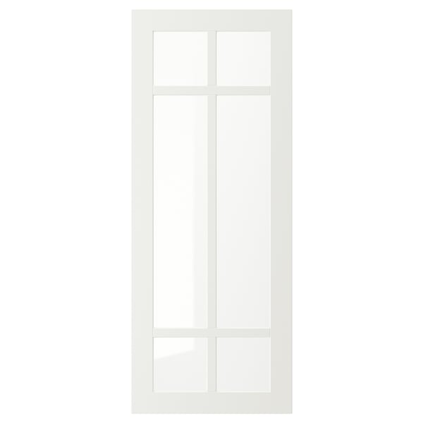 En vit STENSUND skåpdörr med frostad glaspanel. Den har en rektangulär form med en elegant, modern design, lämplig för köksskåp.
