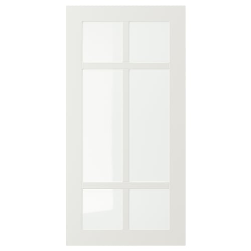 En vit STENSUND skåpdörr med en glaspanel uppdelad i fyra sektioner med träramar, designad för köksbruk.