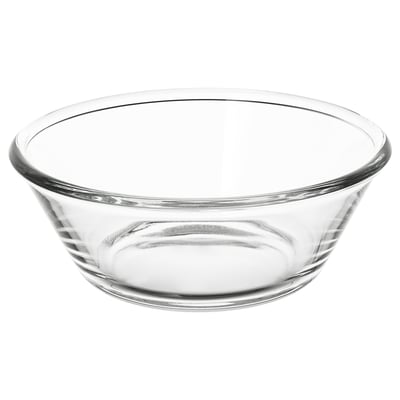 Skål i klart glas, enkel design, rund form. Perfekt för servering av mat och dryck.