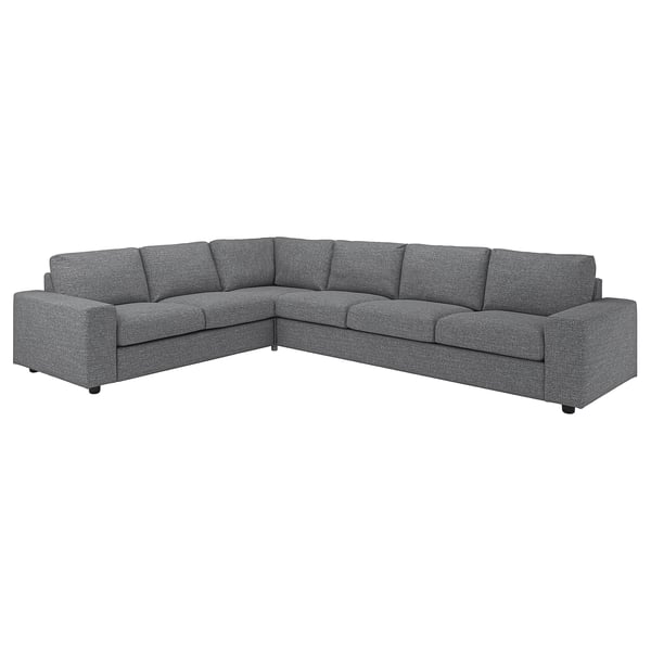 En grå VIMLE sektionssoffa med modern design som ger en mysig och mångsidig sittlösning.