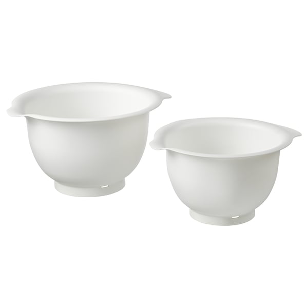Två vita VISPAD-blandningsskålar, en stor och en liten, designad med halkfri botten och pip för enkel hällning.