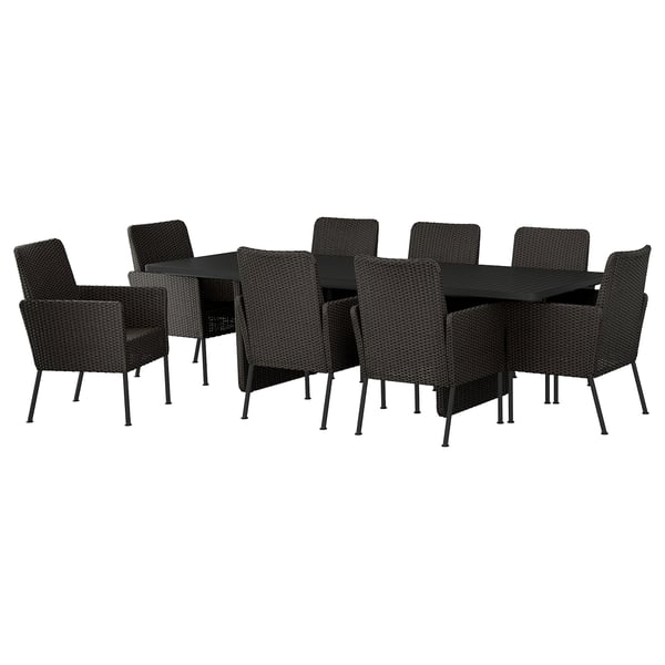 Grå VITTSKÄR uteservering med 8 korgstolar, modern design.