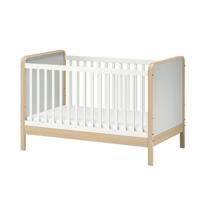 ÄLSKVÄRD white & natural wood baby cot with low base and safety guard.