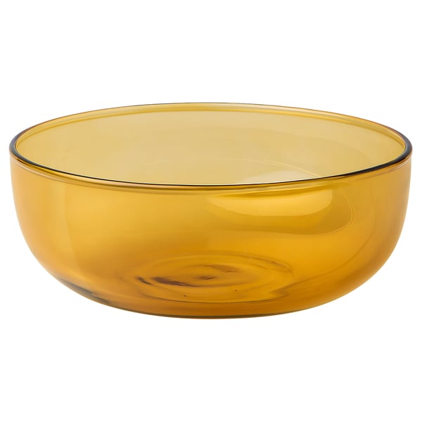 Amber glass bowl, round shape, organic design, mouth-blown, decorative.