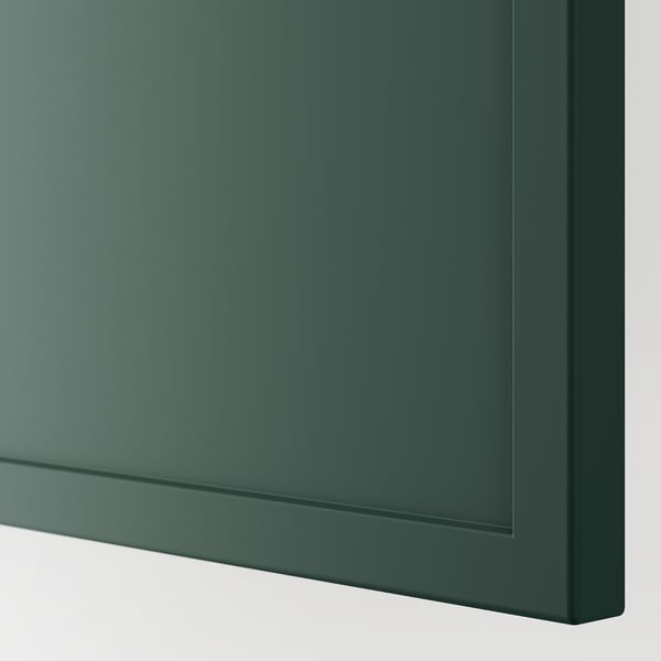 Dark green cover panel, smooth finish. Sides show thin frame design, high-quality detail.
