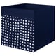 Cube-shaped navy blue storage box with white polka-dot pattern, made from recycled polyester.