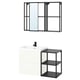 Modern bathroom setup: white cabinet, black shelving, wall mirror. Minimalist design with clean lines.