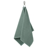 Green GULVIAL cotton towel hangs neatly on hook, soft and textured.