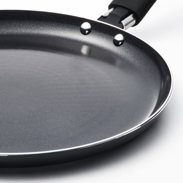Modern non-stick pancake pan with sleek handle, ideal for even heat distribution.