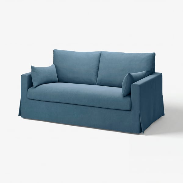A blue HYLTARP sofa-bed with a sleek, modern design. The sofa is upholstered in a soft, durable fabric, featuring a comfortable, inviting appearance.