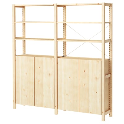 IVAR wooden bookshelf, natural finish, rectangular shape, four tall legs, adjustable shelves, two cabinet sections, clean design.