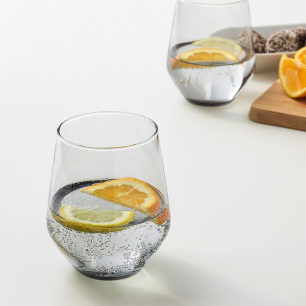 Two glasses with lemon, lime, and orange slices, showcasing aromas and flavours for wine.