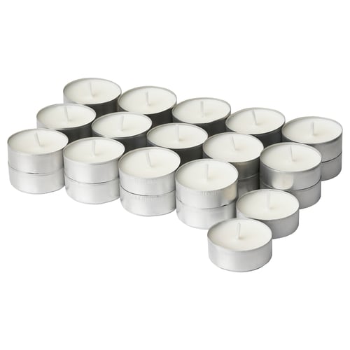 Group of white tea light candles, cylindrical shape, silver aluminium holders.