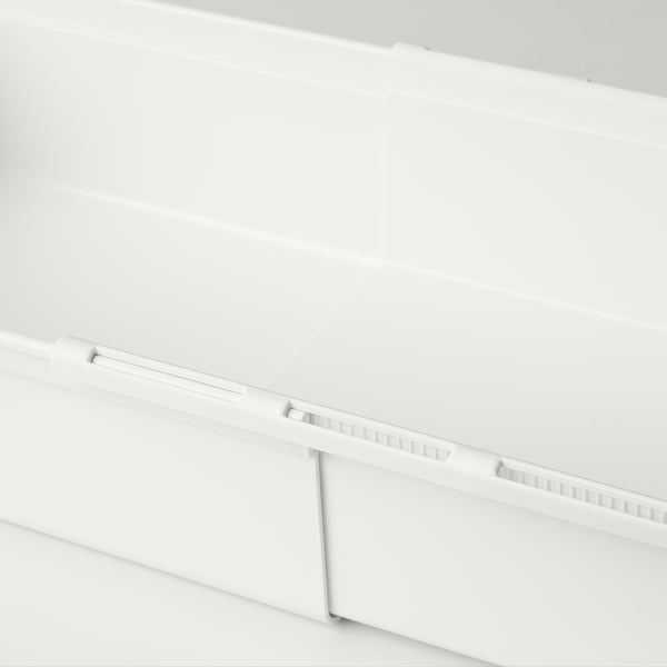 White plastic storage box, extendable, clean interior, modern design.