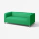 Bright green, modern sofa with metal legs, minimalist design.