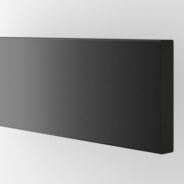 Dark grey drawer front, smooth and sleek, part of modern storage solution.