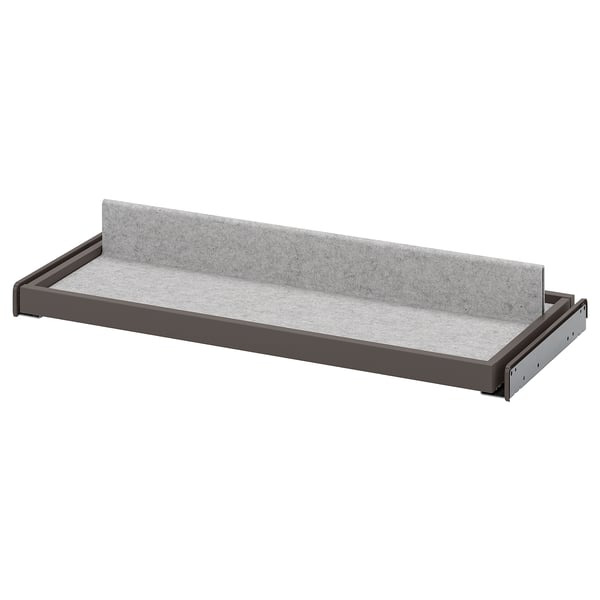 KOMPLEMENT grey pull-out drawer, modern design, felt lining, metallic frame, rectangular shape.