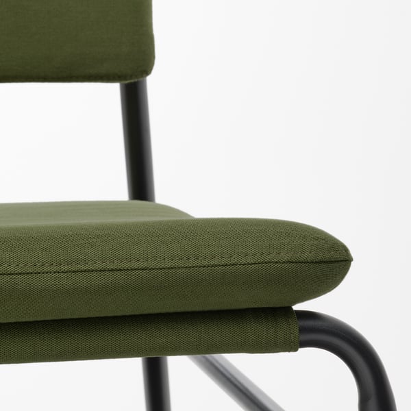 Modern olive-green upholstered chair with sleek black frame, showcasing quality design and comfort.