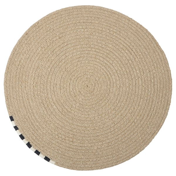 Round, natural jute MÄVINN place mat with black & white border.