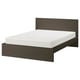 A black MALM bed with a white mattress.